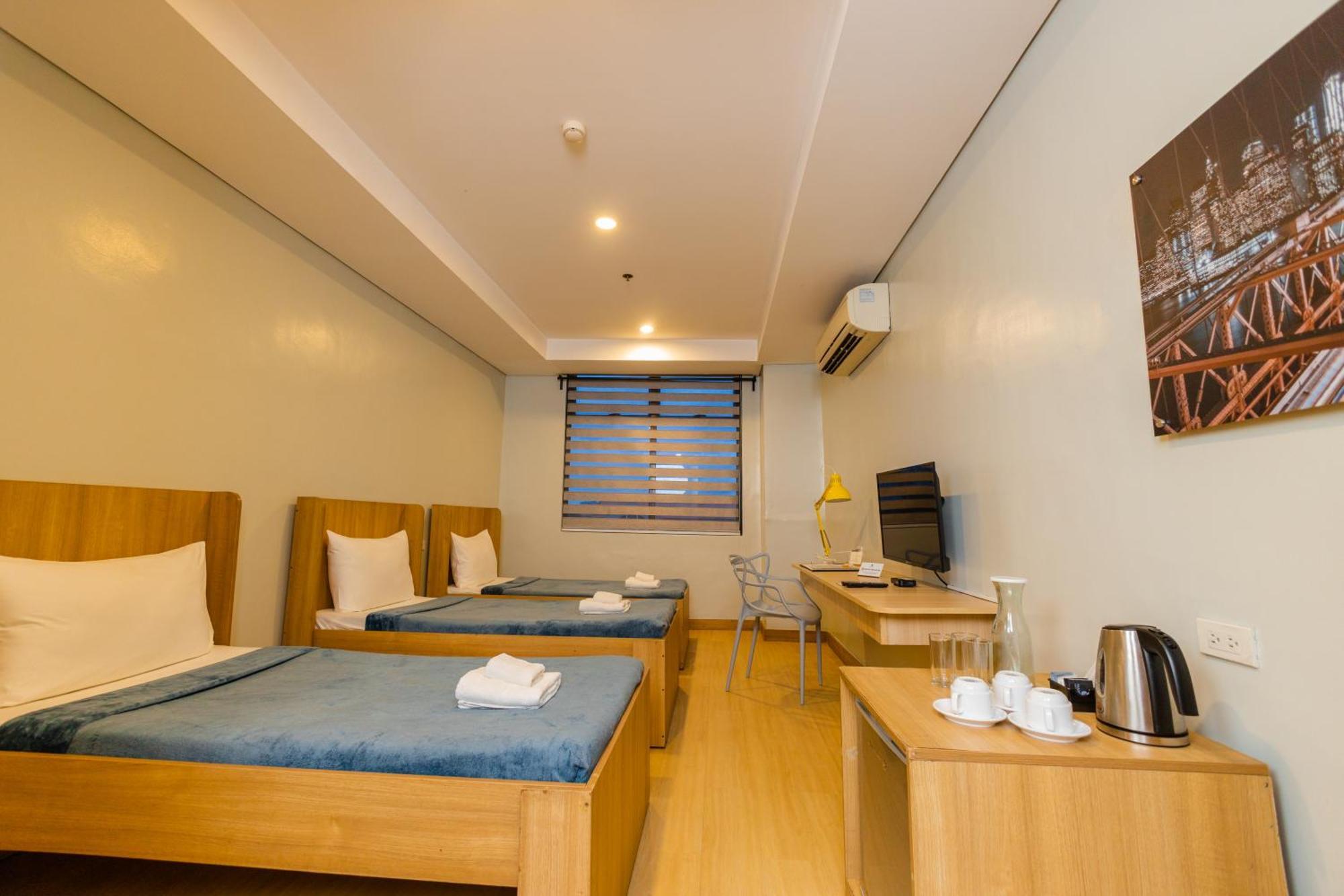 Madison 101 Hotel + Tower Кесон Сити Екстериор снимка