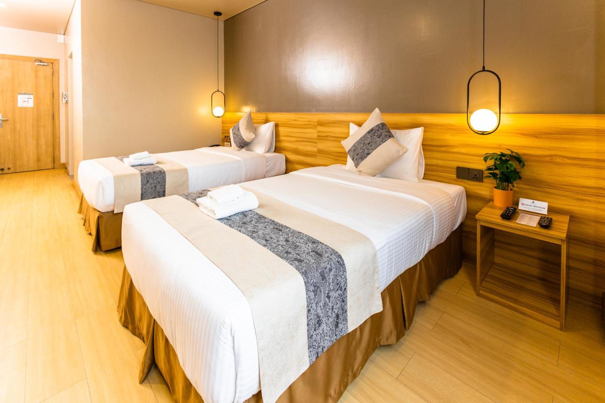 Madison 101 Hotel + Tower Кесон Сити Екстериор снимка